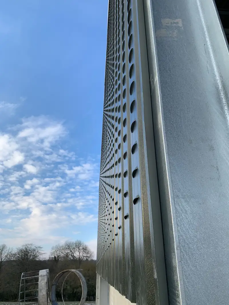 Close-up detail of galvanised steel purlins and steelwork